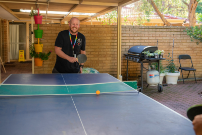 man playing ping pong