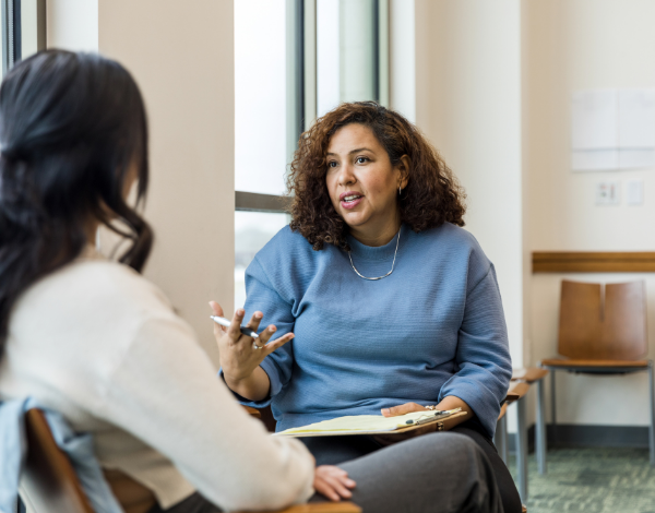 Woman interviewing someone