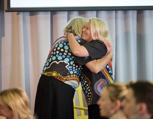 two women hugging