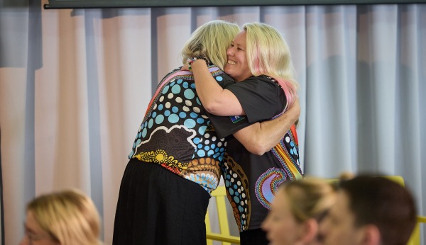 two women hugging