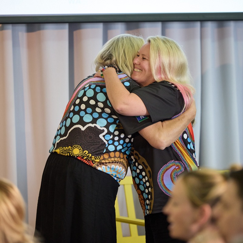 two women hugging